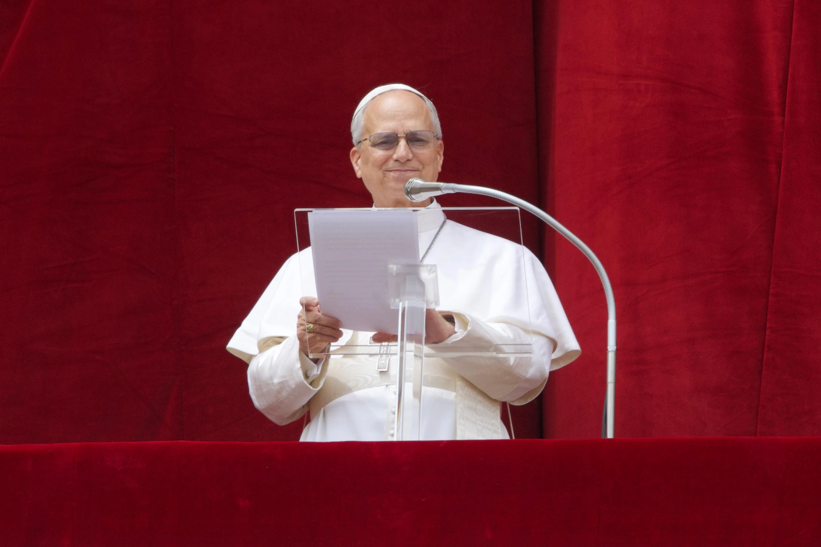 Pope Leo XIV smiles as a jubilant crowd joins in prayer on Sunday, May 11, 2025.?w=200&h=150