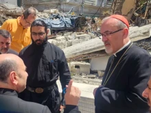 The Latin patriarch of Jerusalem, Cardinal Pierbattista Pizzaballa, speaks with Father Gabriel Romanelli, pastor of Holy Family Church, during his December 2024 visit to Gaza.
