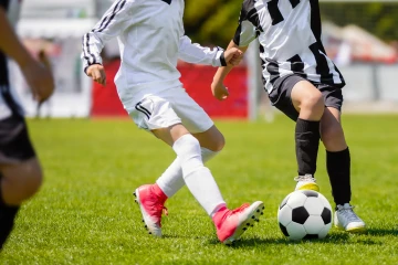 Kids playing soccer
