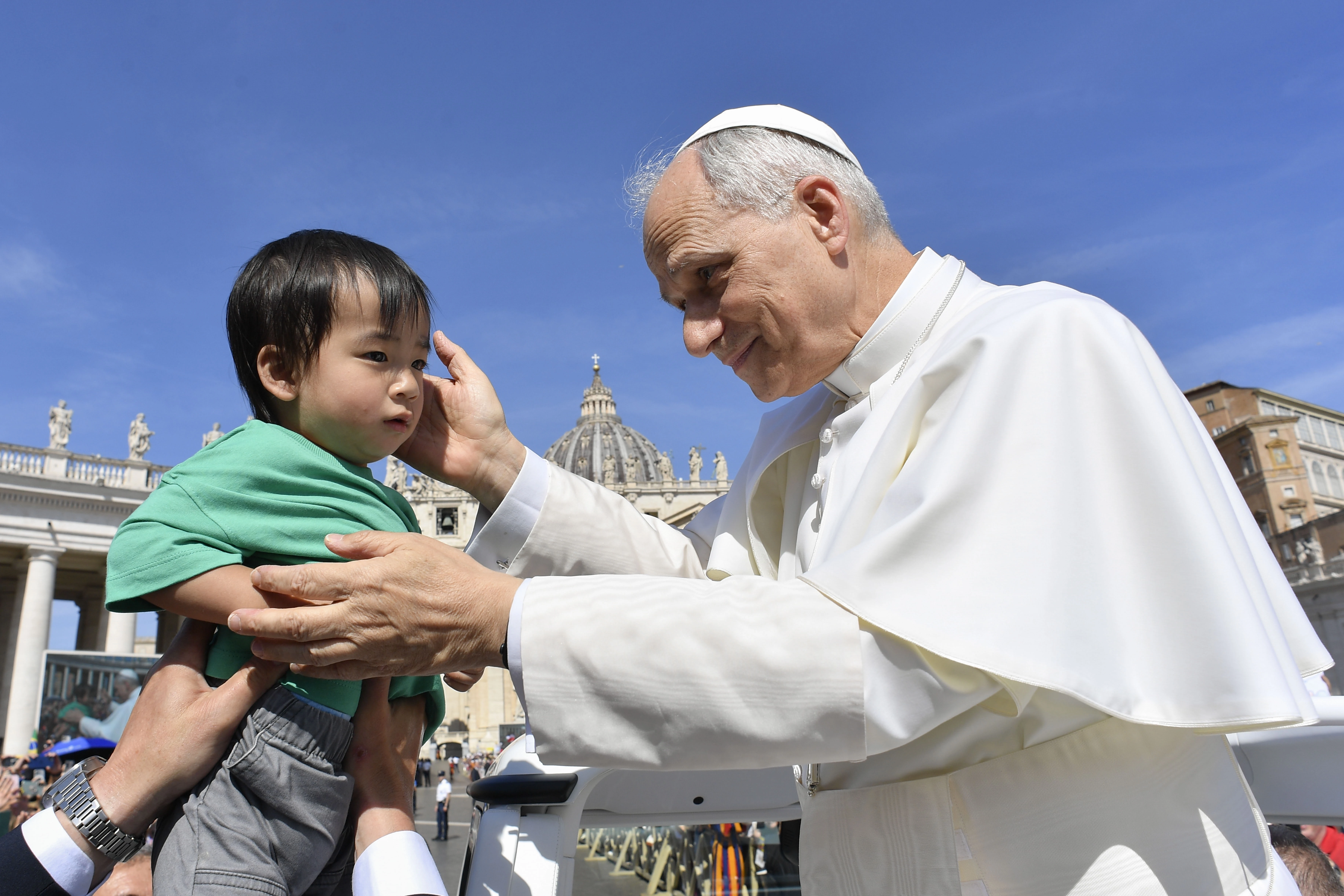 Pope Leo XIV blesses a small attendee at the general audience in St. Peter’s Square on Wednesday, June 4. 2025.?w=200&h=150